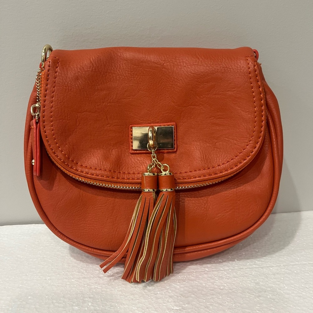 Charming Charlie Vibrant Orange Crossbody Bag with Tassels